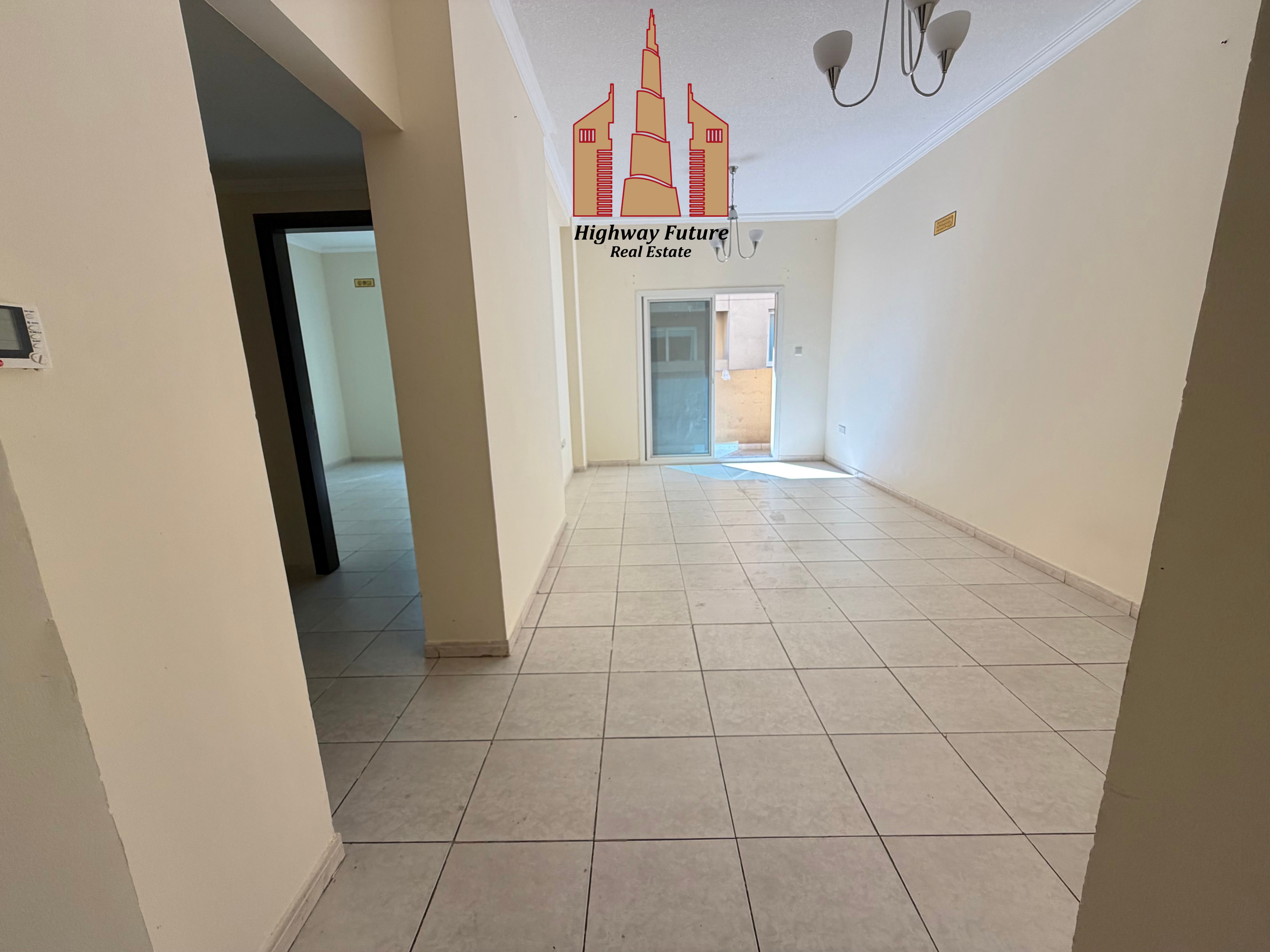 Spacious 1Bedroom and Hall in 40,000 AED With Balcony Covered Parking