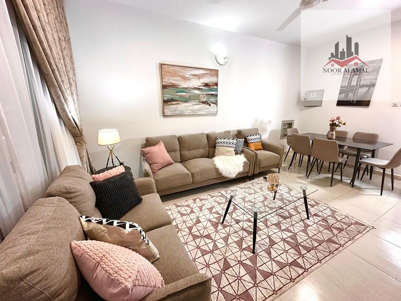 Sharjah, Muwaileh: One-bedroom apartment with living room, two bathrooms, and balcony. Price: 5000 AED (with internet only).