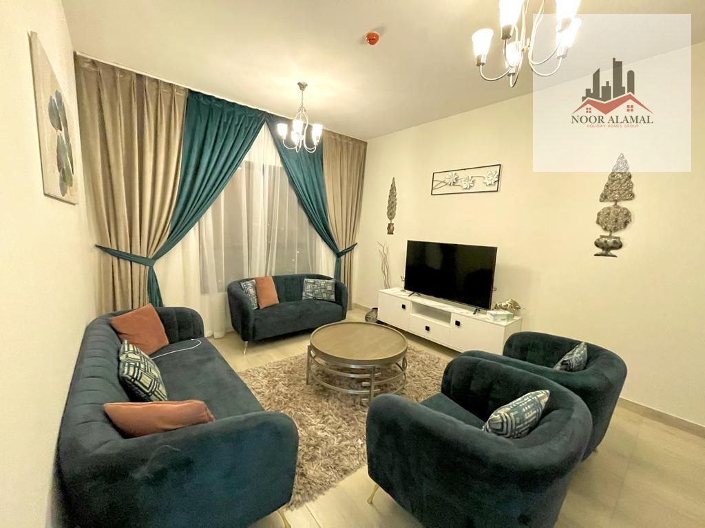 Sharjah Al Taawun, a new building, first tenant, hotel furniture, two rooms, a hall, a kitchen, two bathrooms, and a balcony. The price is 8,000, incl