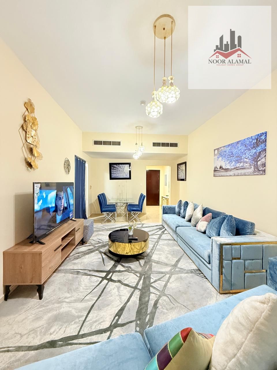 Sharjah Al Khan Beach Tower 1, furnished apartment with hotel furniture, second floor, three rooms, a hall, a maid's room, a kitchen, three bathrooms,