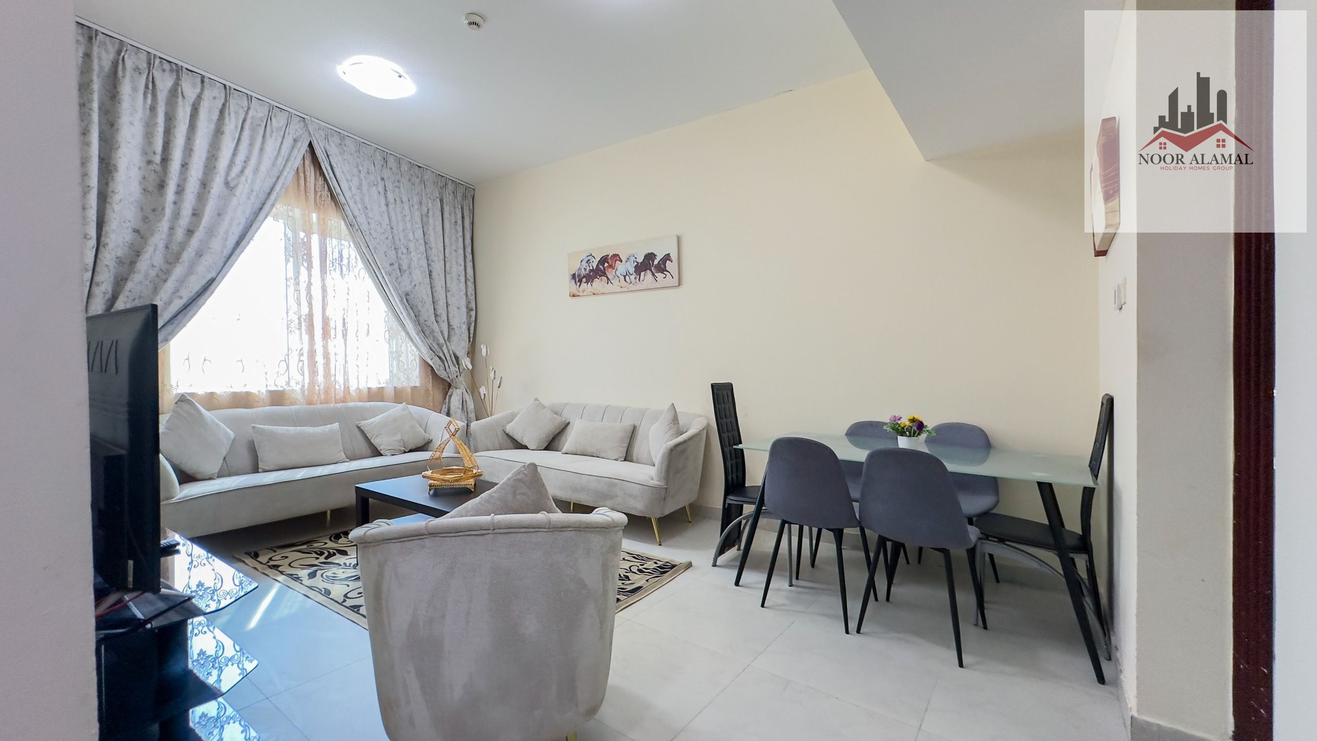 Sharjah, Al Taawun area, furnished apartment with hotel-style furnishings, one bedroom, living room, kitchen, and two bathrooms. Price: 5200 AED inclu