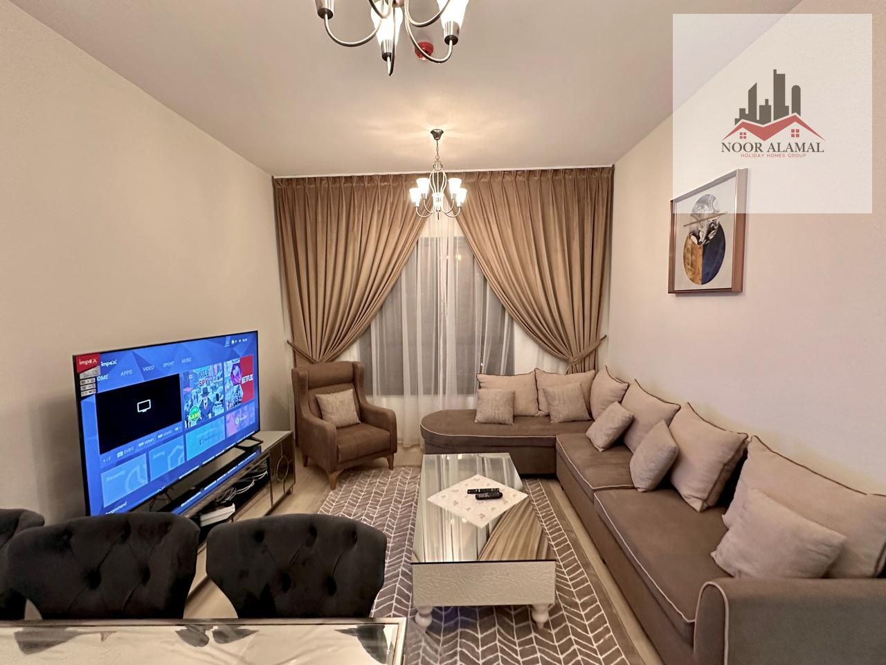 Sharjah, Al Taawun area, new building, hotel-style furnished apartment, two bedrooms, living room, kitchen, and two bathrooms. Price: 7800 AED includi