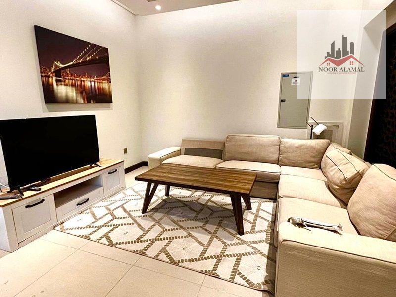 Two bedrooms and a living room in Al Rifaa Compound, hotel-style finishing, super deluxe furnishings, rent 6500 with internet.