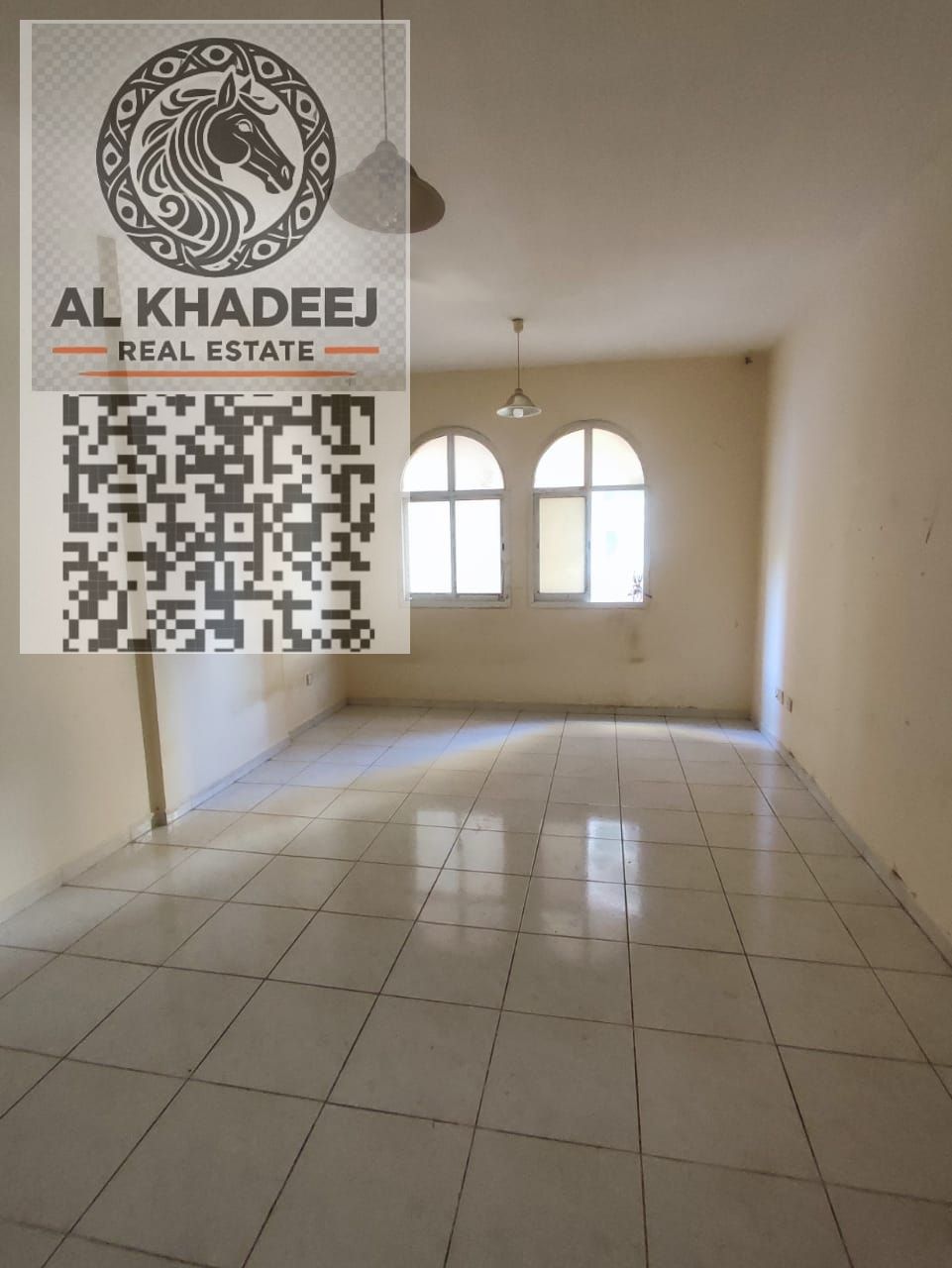 Spacious studio apartment with a semi-detached kitchen in Al Rashidiya 3, next to Grand Mall, with easy access to Dubai and Sharjah.