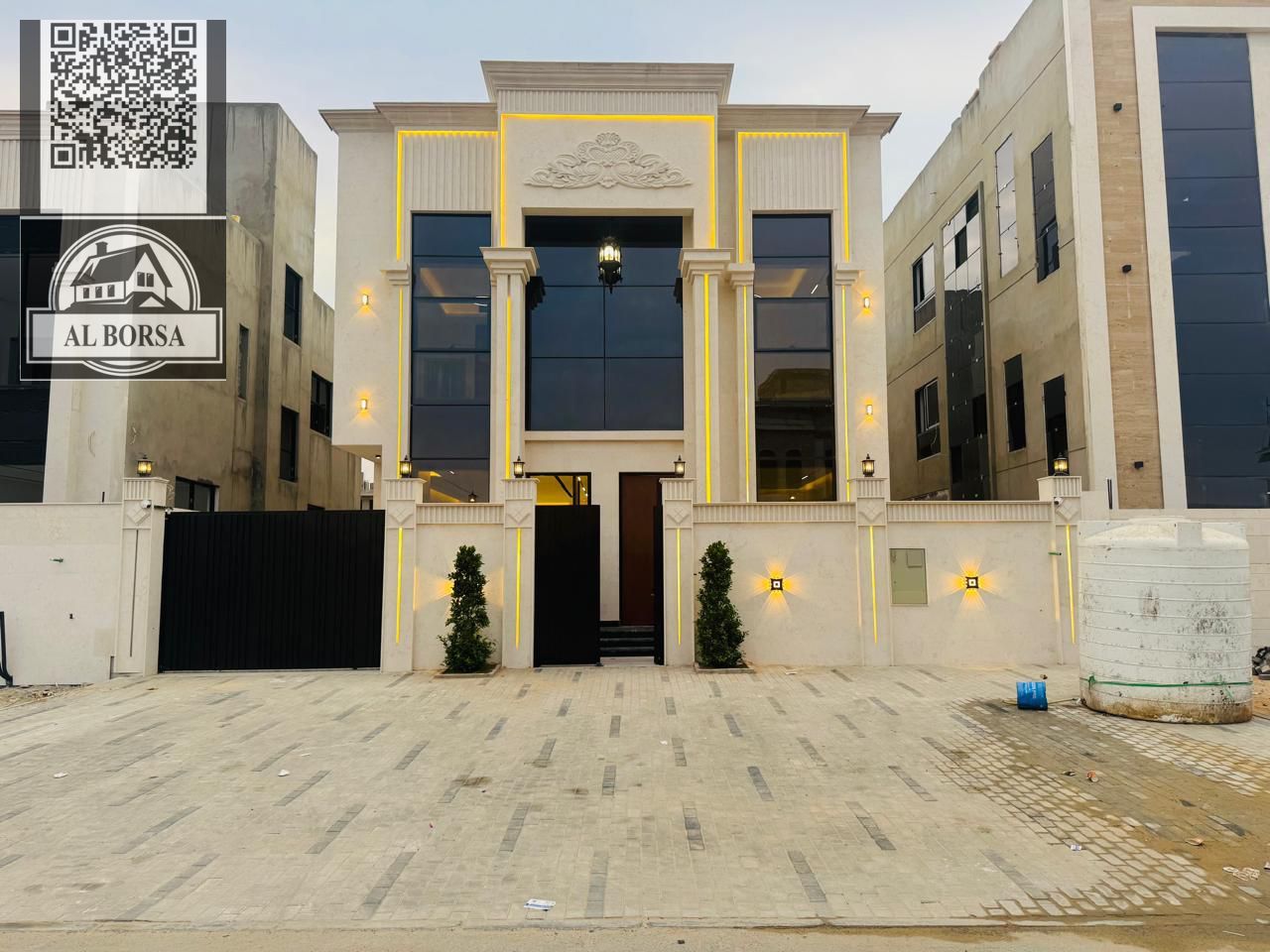 Villa for sale – Al Helio 2, Ajman | 5 master bedrooms with majlis, living room, and maid's room | Includes registration and ownership fees
