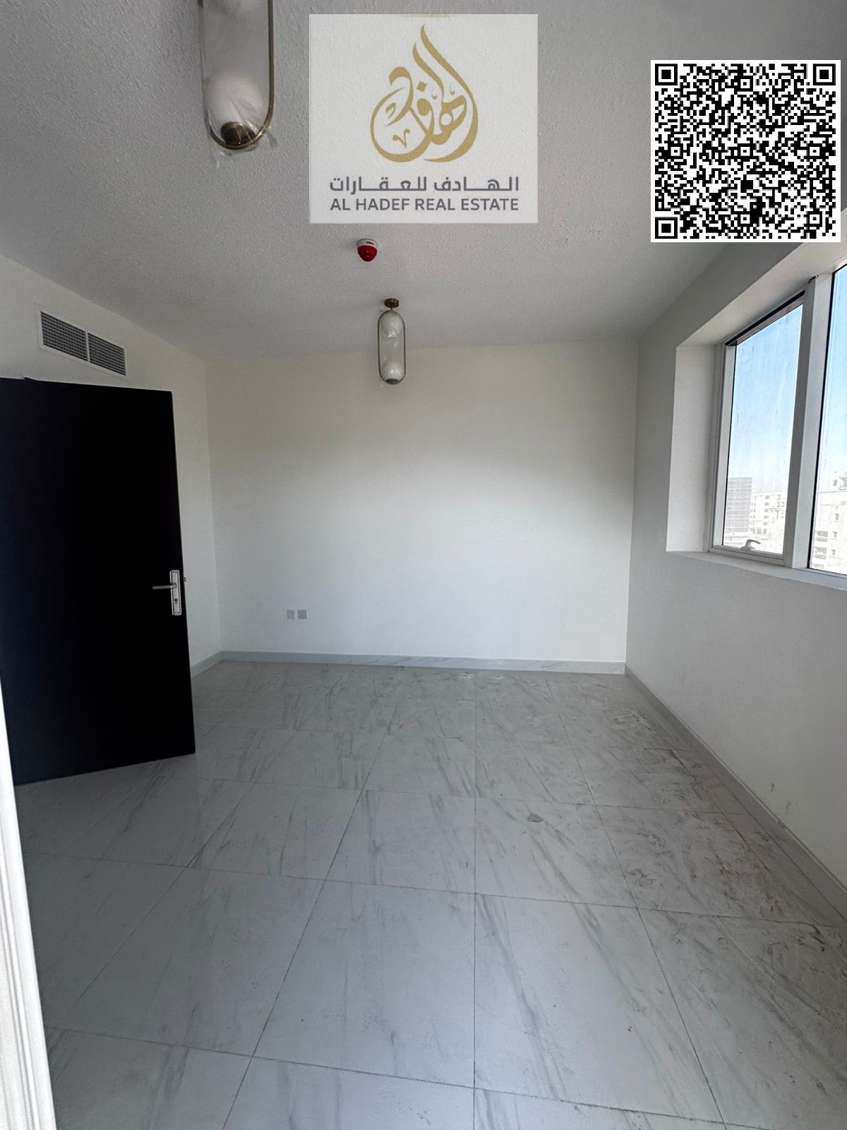 One bedroom, living room, balcony, two bathrooms, and kitchen. Main street, prime location in Al-Jarf 3.