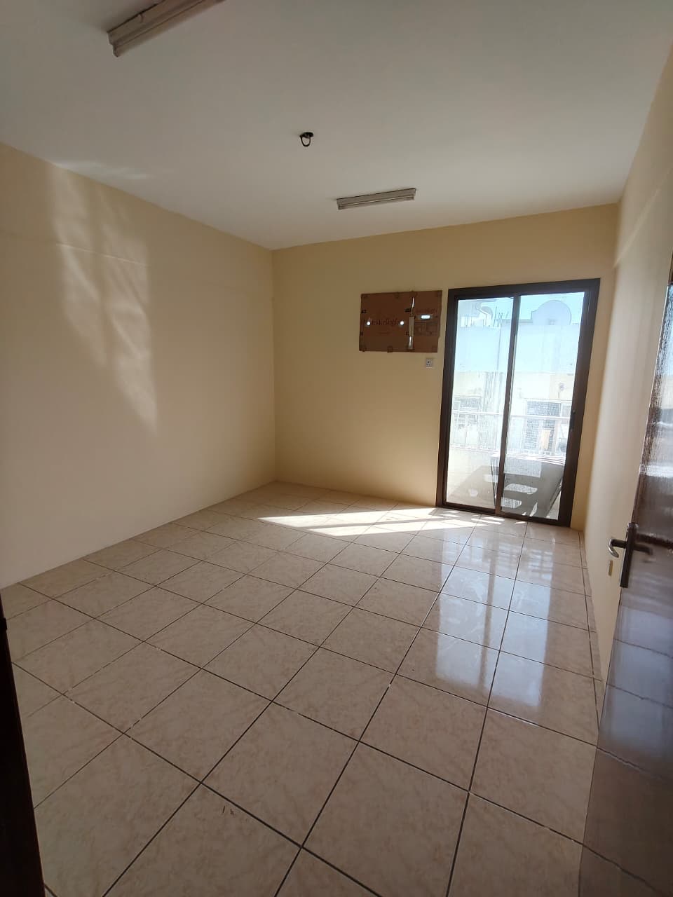 2-bedroom family apartment in the heart of Al Rolla, Sharjah, spacious and well-maintained, exclusive price, close to transport and all services