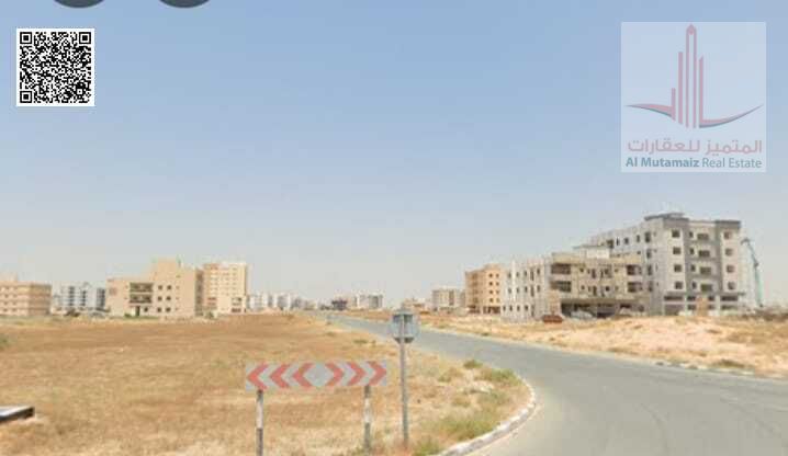 Land for sale in Ajman, Al Rawda area, residential/commercial (G+2), area 8500 sq ft, corner plot on two streets. Asking price 3,100,000 AED.
