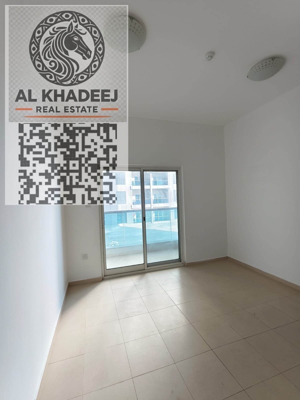 Two bedrooms and a spacious living room with a balcony overlooking the area, in Al Nuaimiya 3, City Towers, close to all services and main roads.
