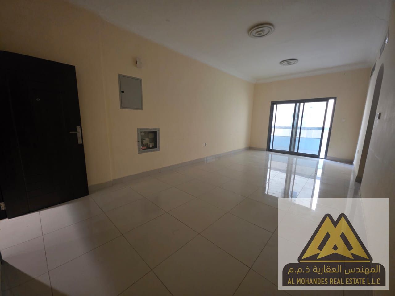 Spacious 2-Bedroom Apartment with Balcony for Annual Rent in Al Jurf – Large Area, Open View, Family-Friendly Building