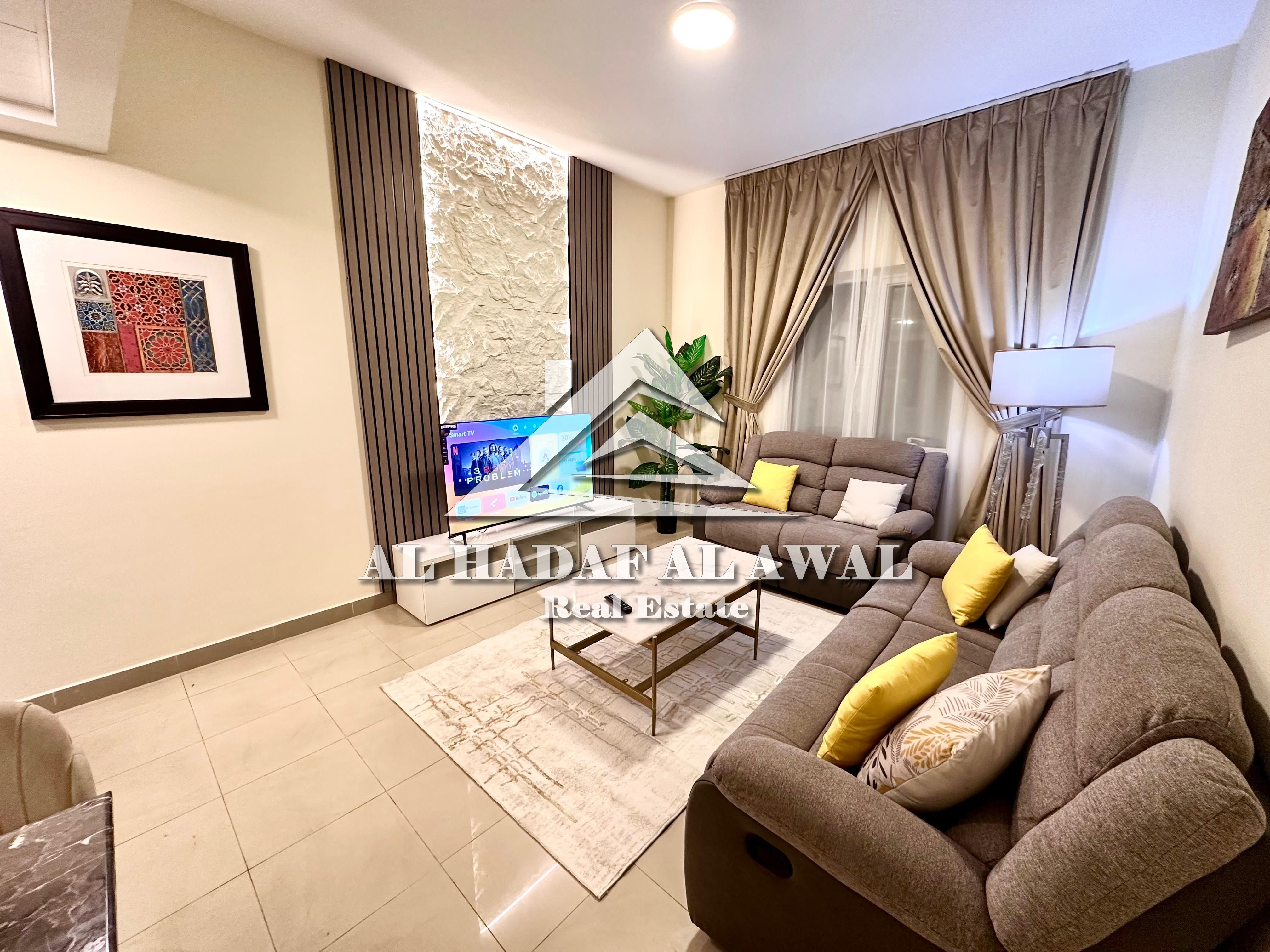 One-bedroom apartment with a living room and distinctive furnishings for monthly rent in Almajaz3- 5500with all bills