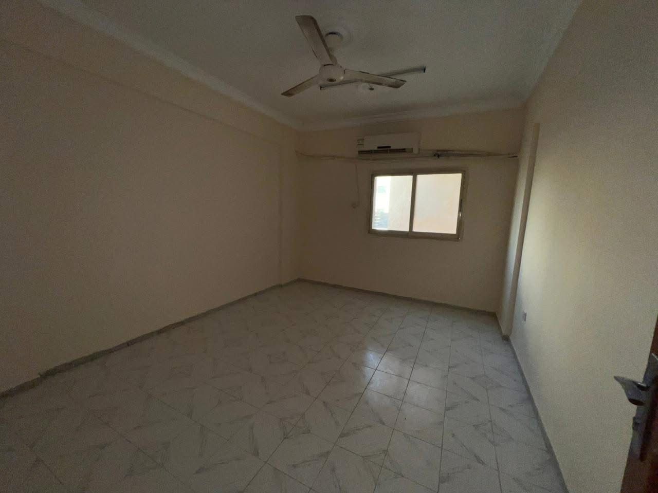 Two-bedroom apartment with living room in Al Rolla, Sharjah, close to transport and all services.