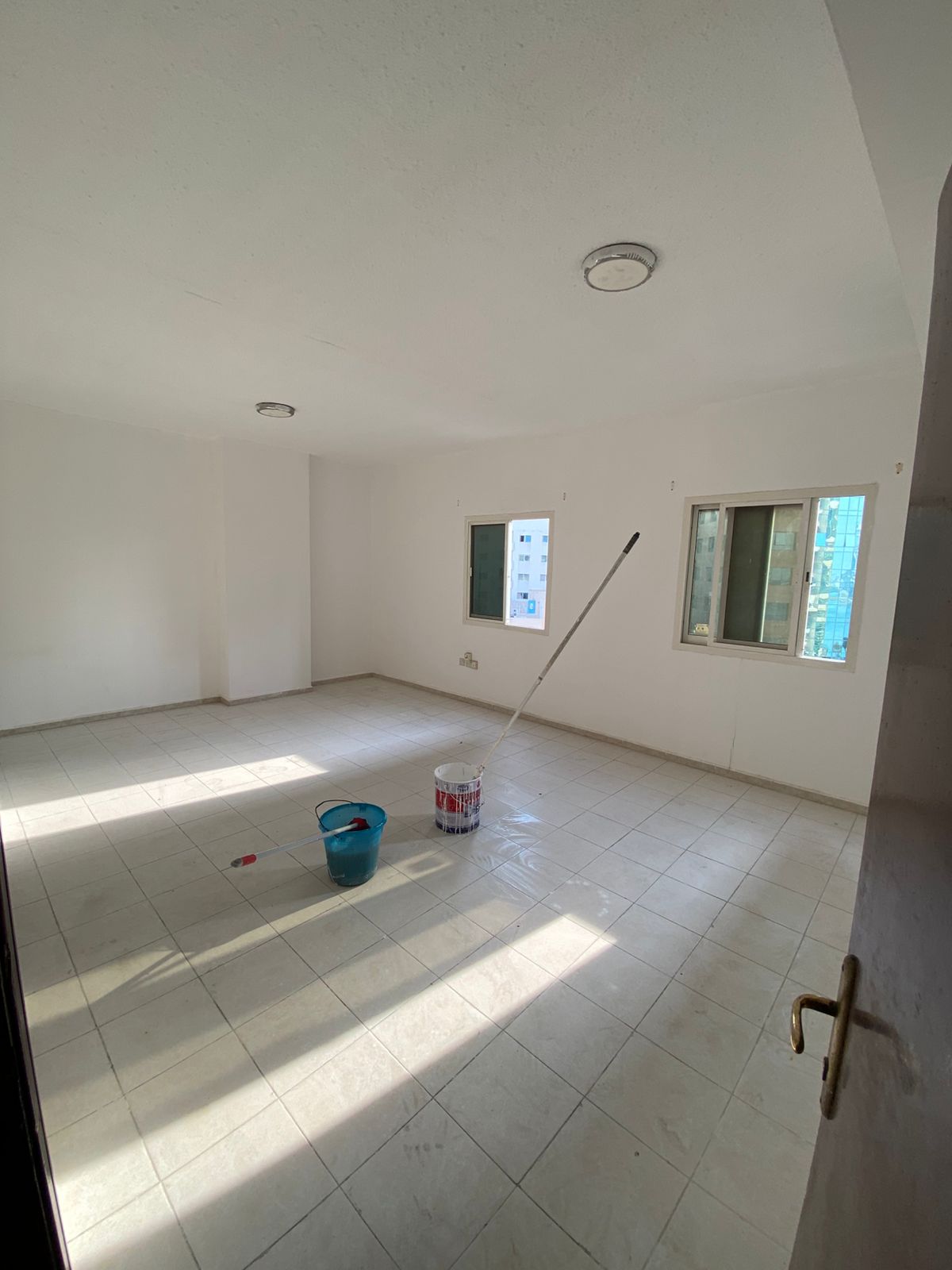 For annual rent in Sharjah, specifically in Al Majaz 2 area: two bedrooms, a living room, two bathrooms, central air conditioning, and an excellent si