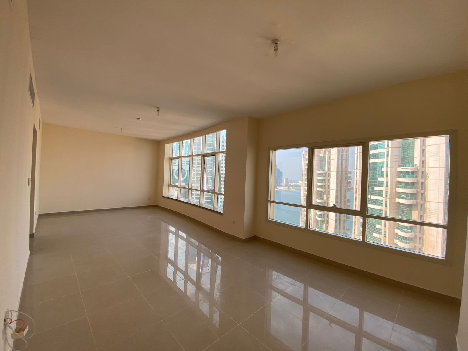 Elegant 2-bedroom apartment in Al Majaz 2 with a stunning sea view, featuring a master maid’s room, 4 bathrooms, built-in wardrobes, excellent space,