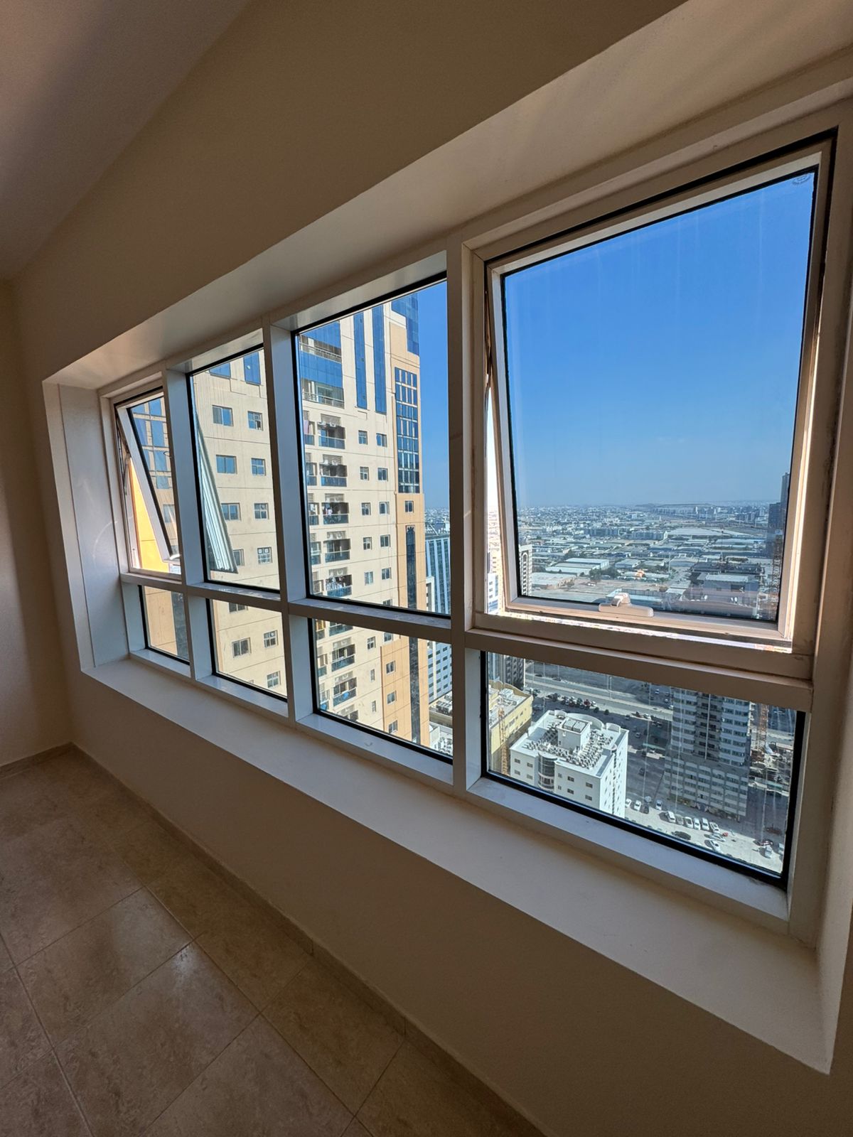 For annual rent in Sharjah, specifically in the Al Taawun area: two bedrooms, a living room, central air conditioning, and an excellent size.
