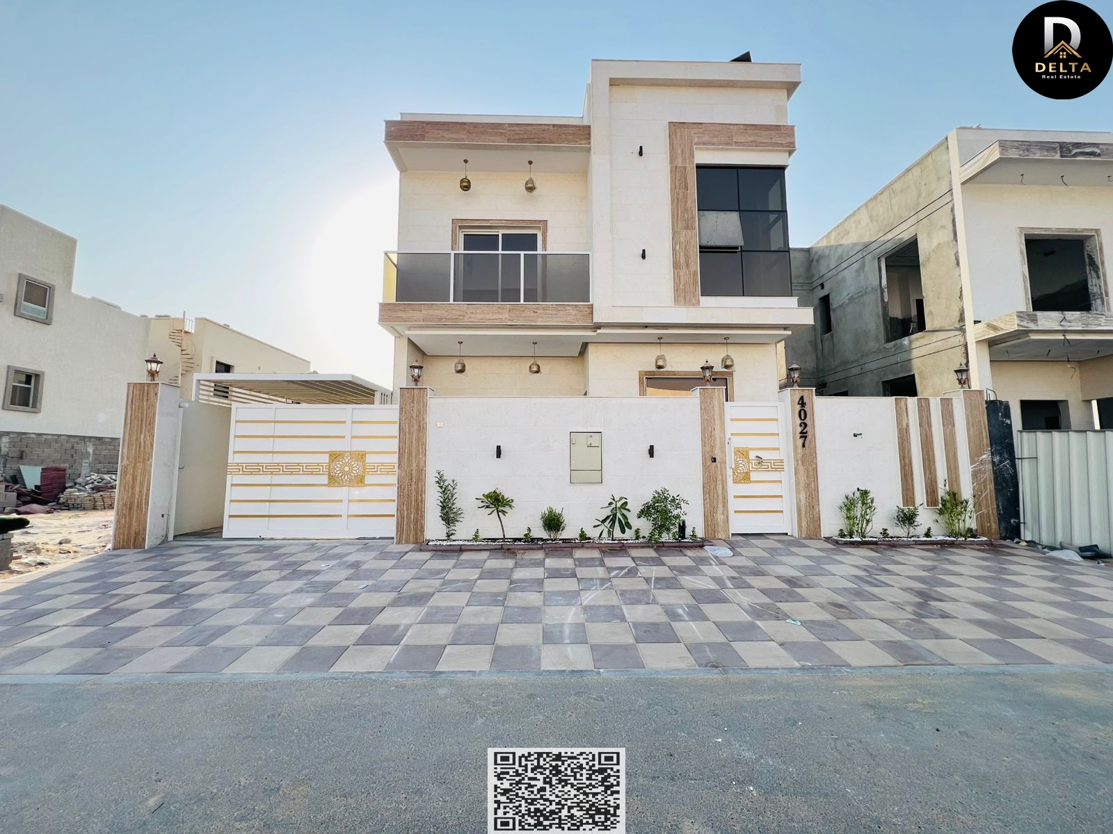 Luxury villa for sale in Al Zahia – Ajman. Super deluxe custom finishing. Prime location on a main road. Includes water and electricity. Freehold owne