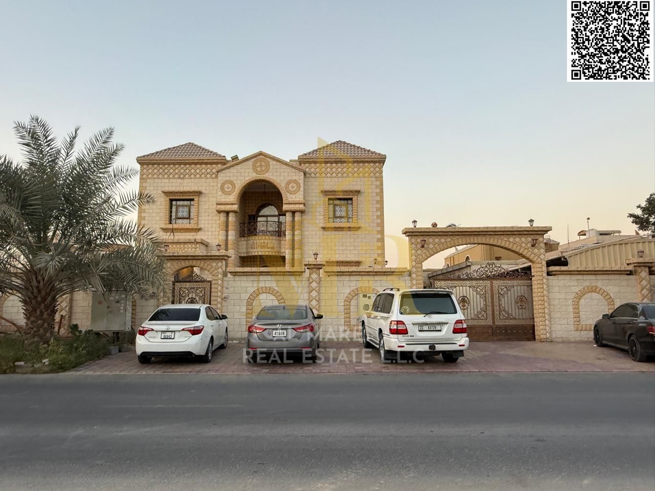 Large villa with an annex near Shurooq Mall on Sheikh Ammar Street. Large garden. Includes registration, electricity, and air conditioning. Freehold o