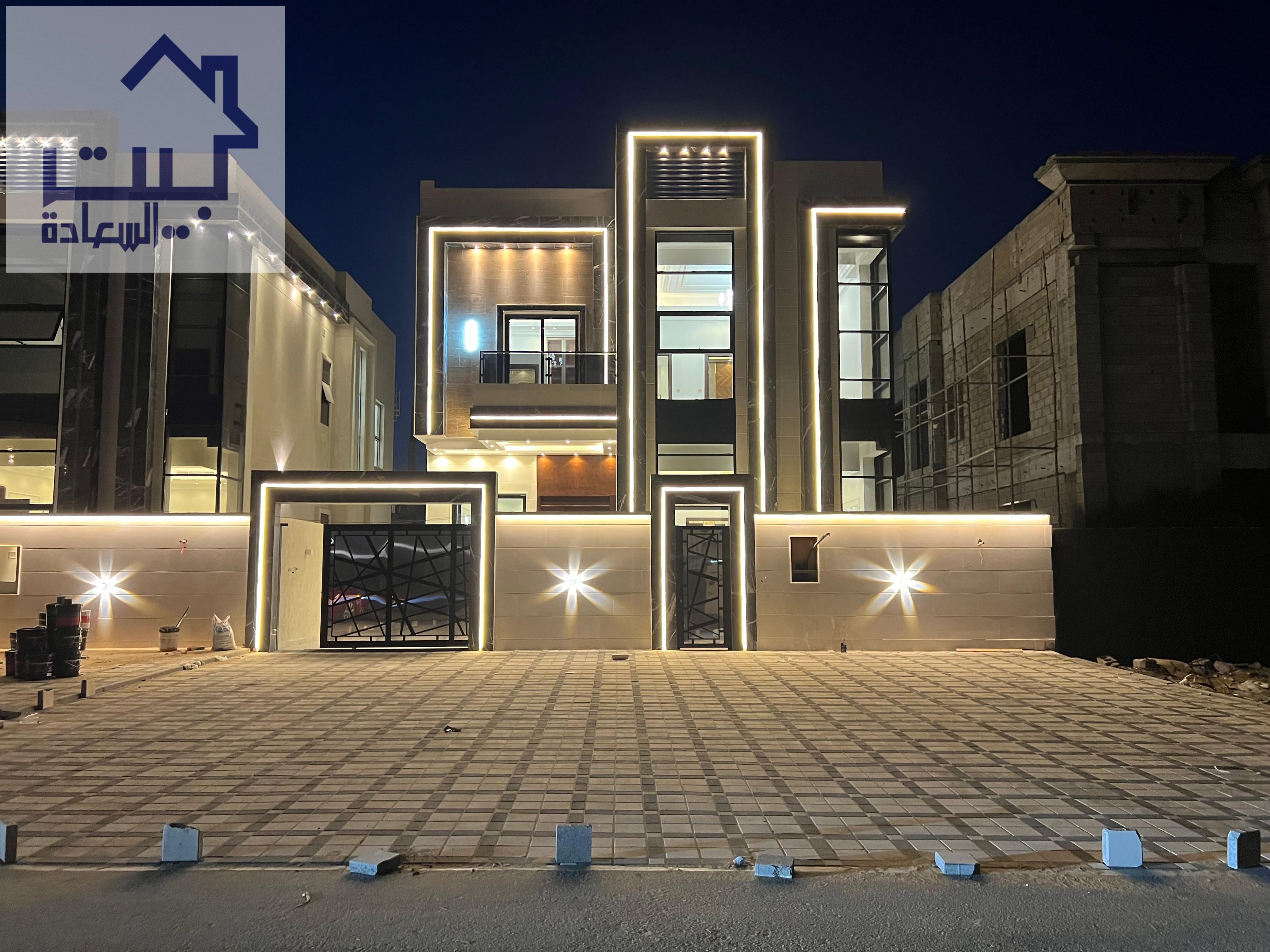 Modern villa for sale in Al Helio 2, Ajman. Two floors, 5 master bedrooms, large front setback, near Sheikh Mohammed Bin Zayed Road.
