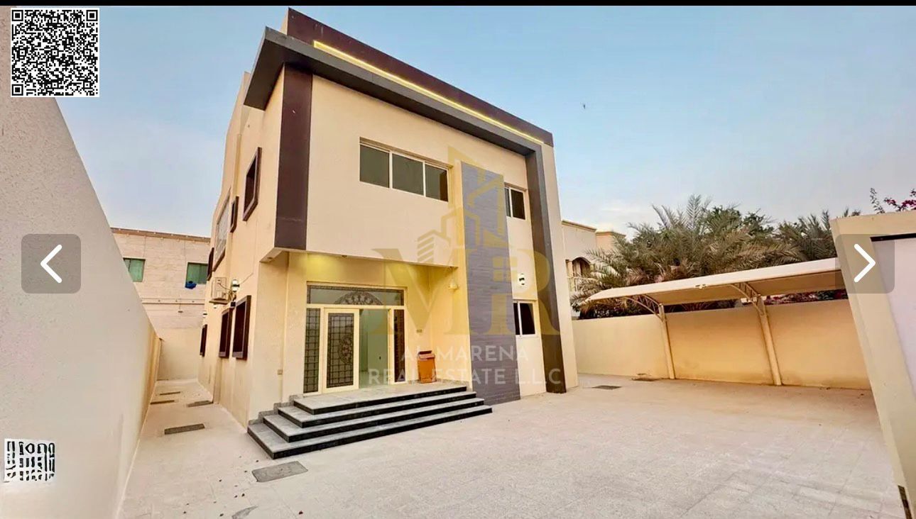 Villa for sale in Al Rawda 1, Ajman. Two floors and a roof terrace. 6 bedrooms. Price: AED 1,850,000 including electricity, water, and air conditionin