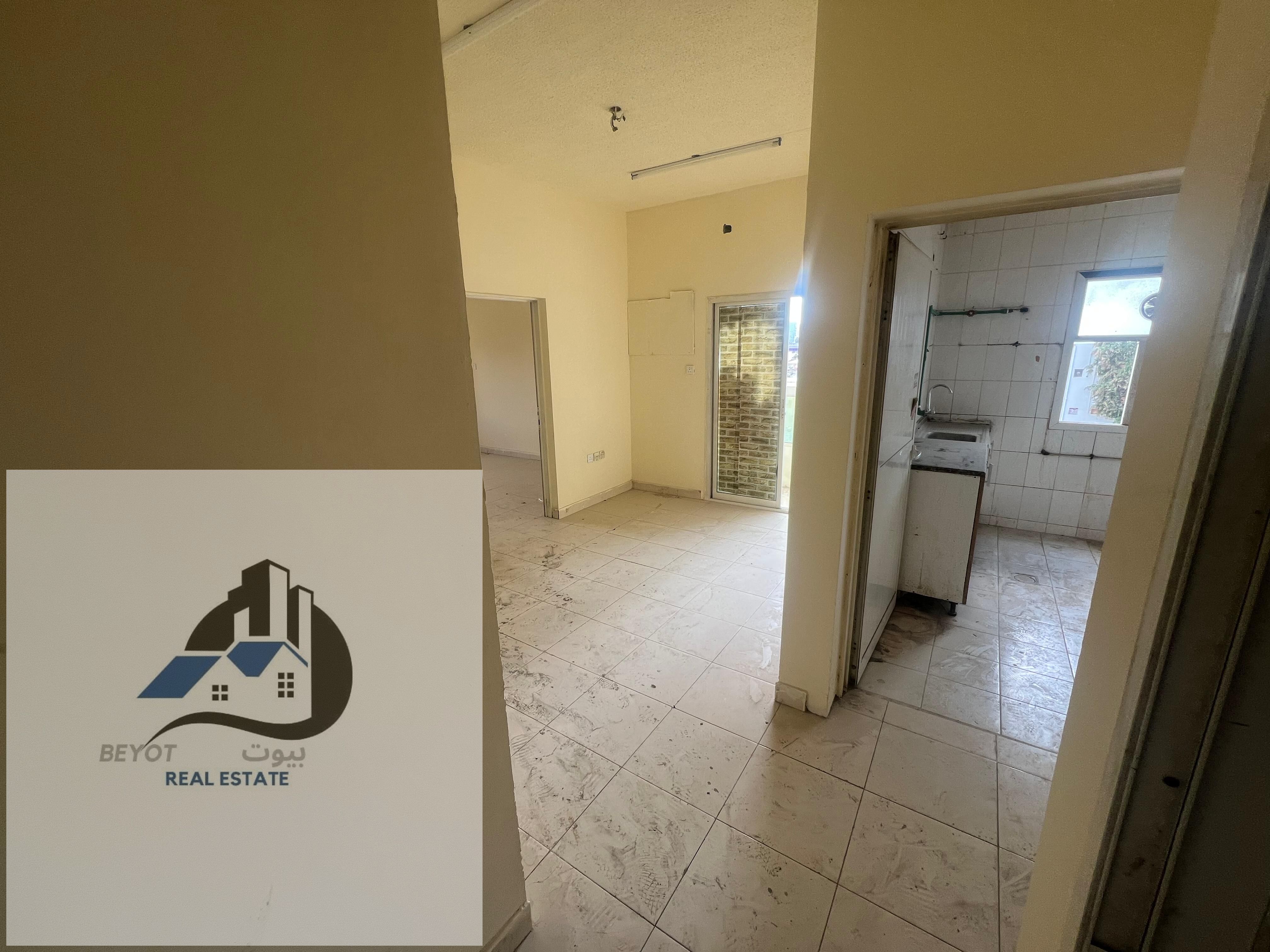 For annual rent in Ajman: Two bedrooms and a living room