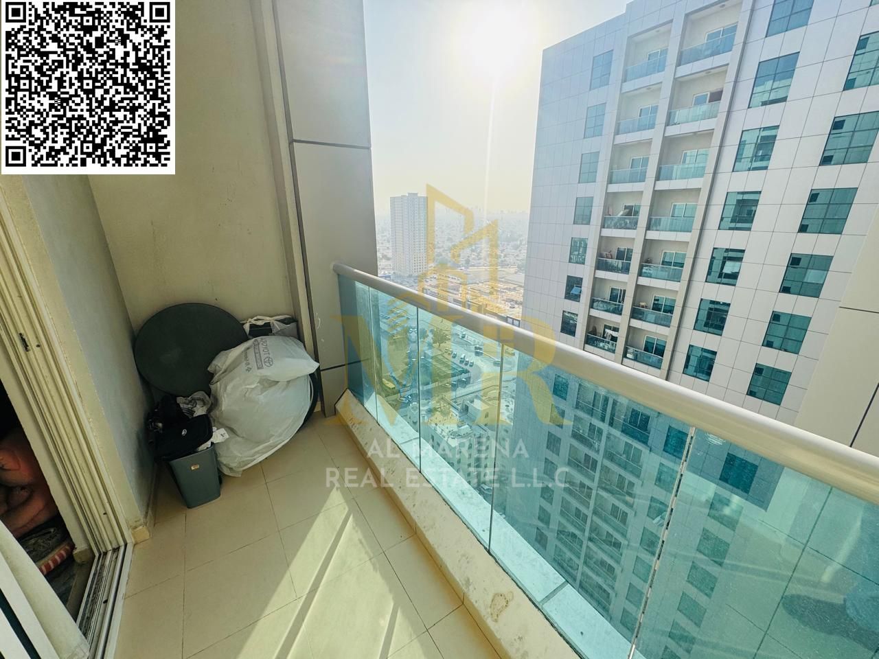 Apartment for sale in City Towers – Ajman | 1 bedroom + 2 bathrooms + partial view of Sharjah