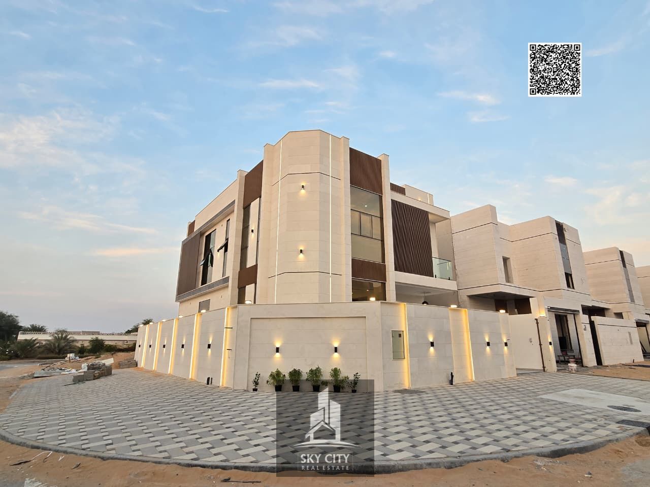 For sale: Villa in a prime strategic location (corner) next to the mosque (two floors + roof). Excellent location near all services