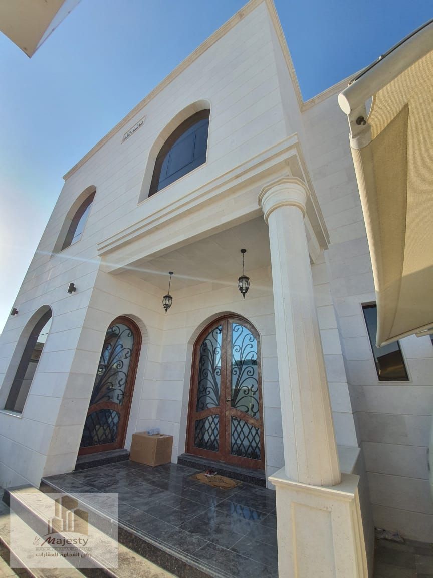 For sale: a new two-story villa with an electric gate, jacuzzi, and security cameras in the Subha area of Sharjah.