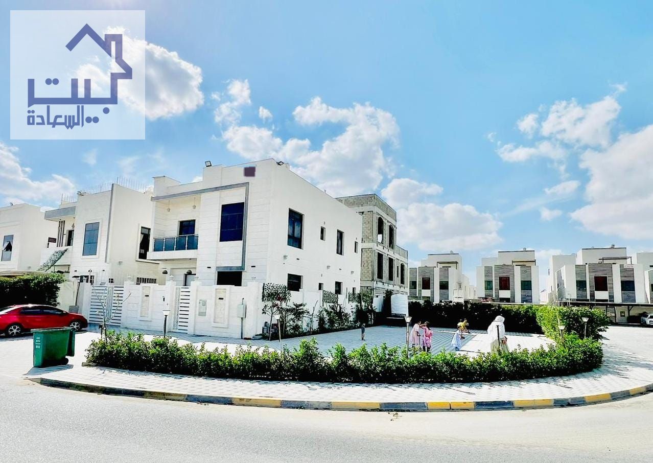 For rent: Modern villa in Al Yasmin area, corner plot on two streets, large setback in front of the villa for cars, 5 master bedrooms, maid's room, li