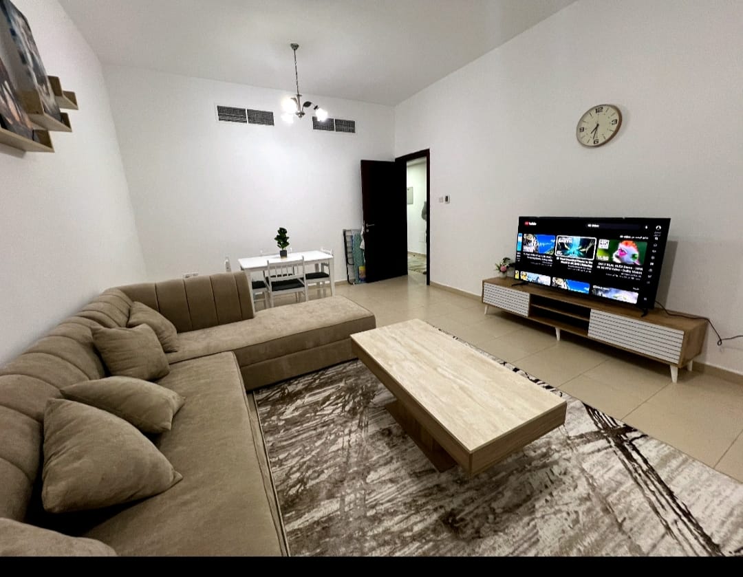 **Fully furnished 2BR apartment for monthly rent in City Towers, Al Nuaimiya Ajman. Spacious, clean, Sheikh Khalifa Street view, opposite Grand Mall.
