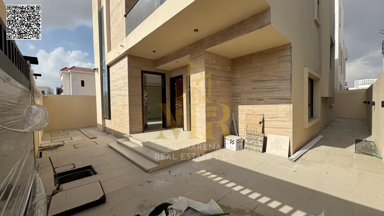 Luxury villa in Al Yasmin, Ajman, directly behind the mosque. Two floors and a rooftop, ready for immediate occupancy with high-end finishes. Price in