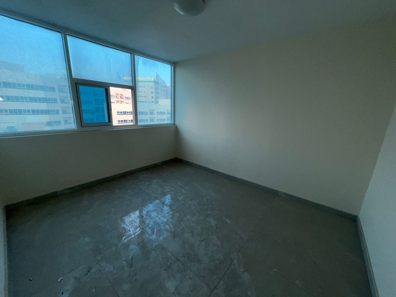 Available in Sharjah Al Nahda: spacious 2-bedroom apartment with living room and 2 bathrooms, suitable for family or staff, near Dubai exit