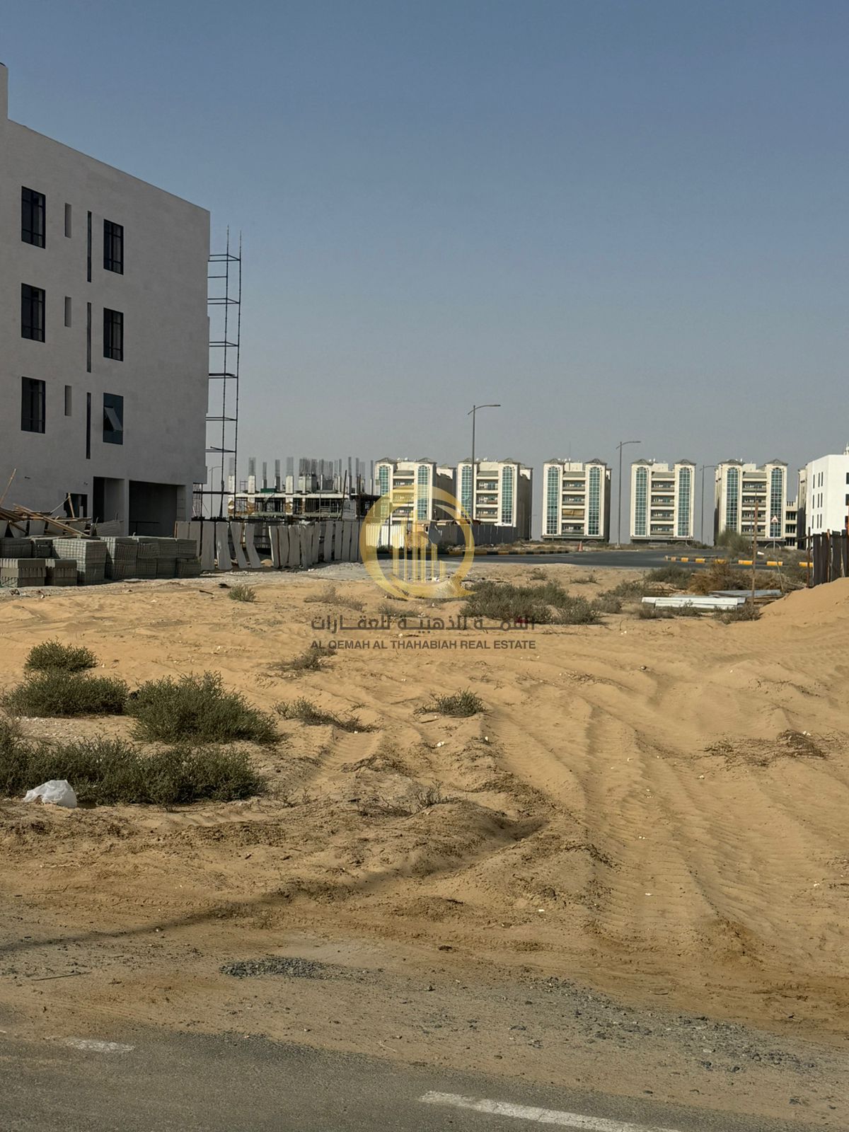 For sale: residential and commercial land in Tilal City area, Al-Siyouh suburb. Freehold ownership for all nationalities, with an area of 8,072 square