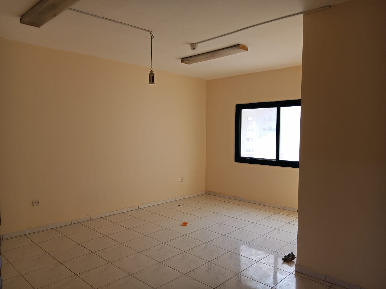 A distinctive residential opportunity in one of Sharjah’s most vibrant and desirable areas. A one-bedroom apartment with a living room, featuring a sp