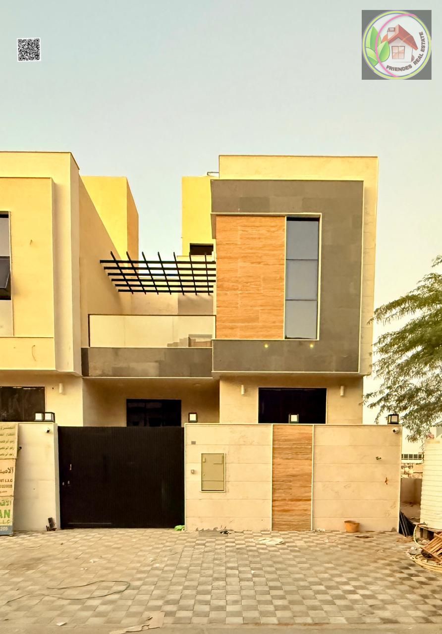 A distinctive, luxurious two-story villa with a roof, super deluxe finishing, in the Al Yasmin area, freehold ownership for all nationalities.