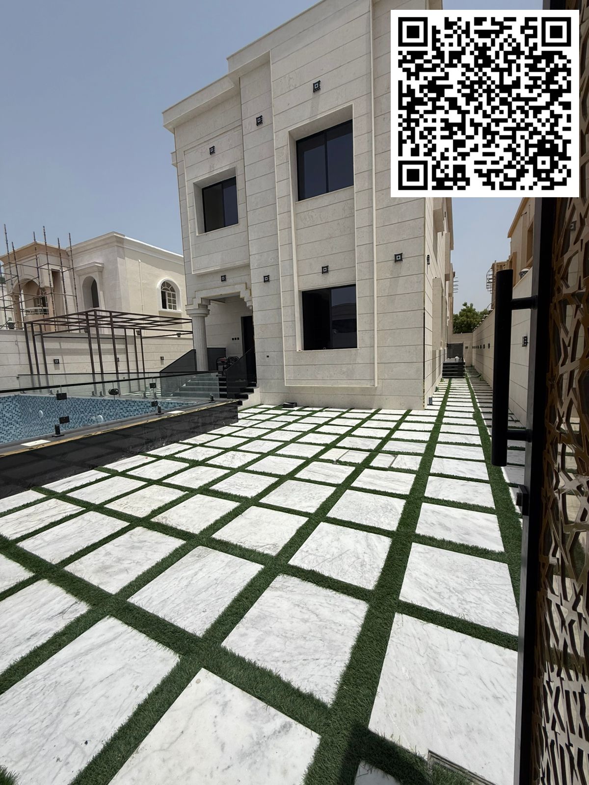For sale: Brand new villa in Ajman, Al Rawda area, first occupancy, VIP finishing, consisting of five master bedrooms, a large kitchen equipped with a