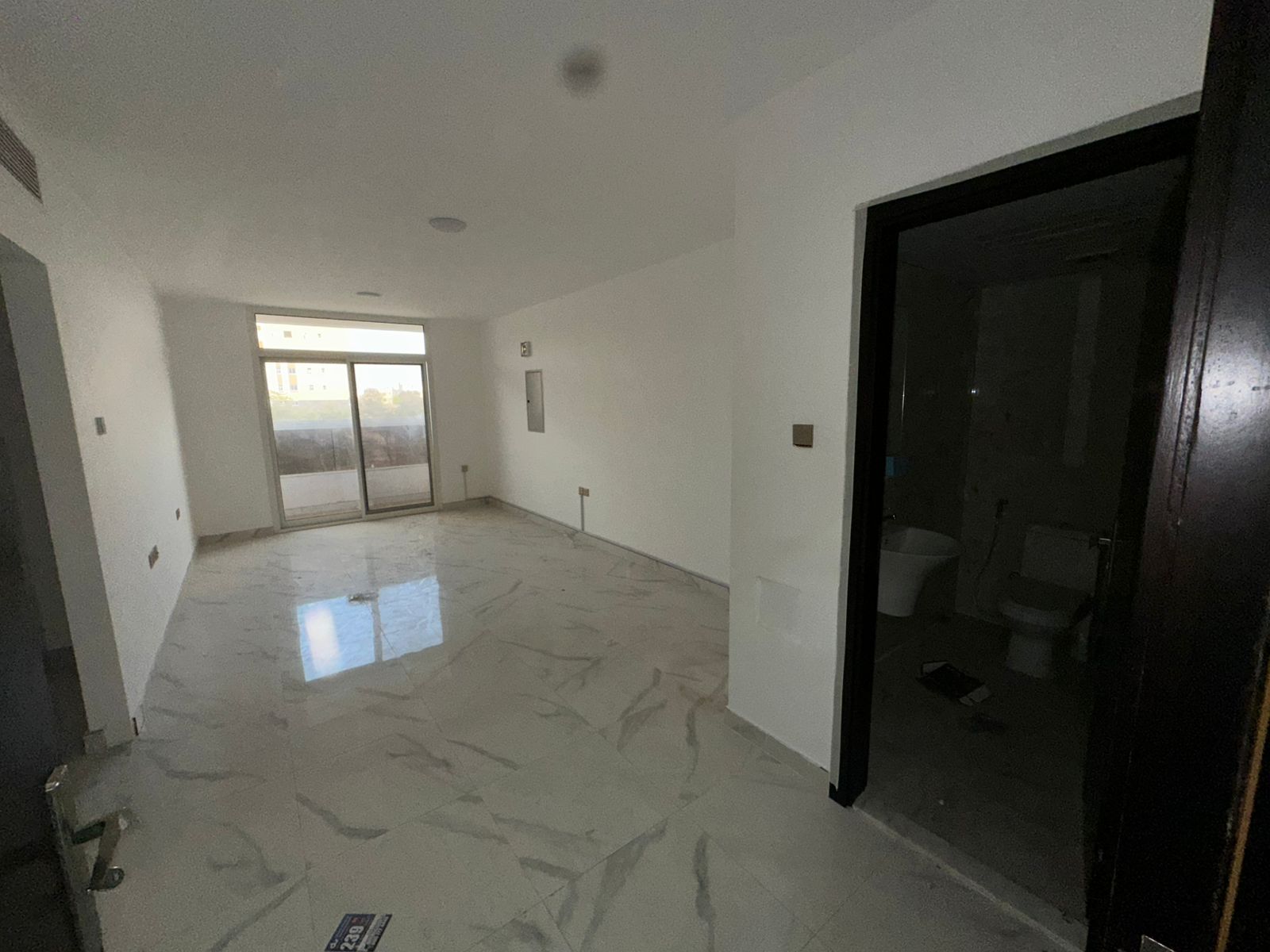 Two rooms and a large living room, second occupancy in Al-Muwayhat 3, on the main street.