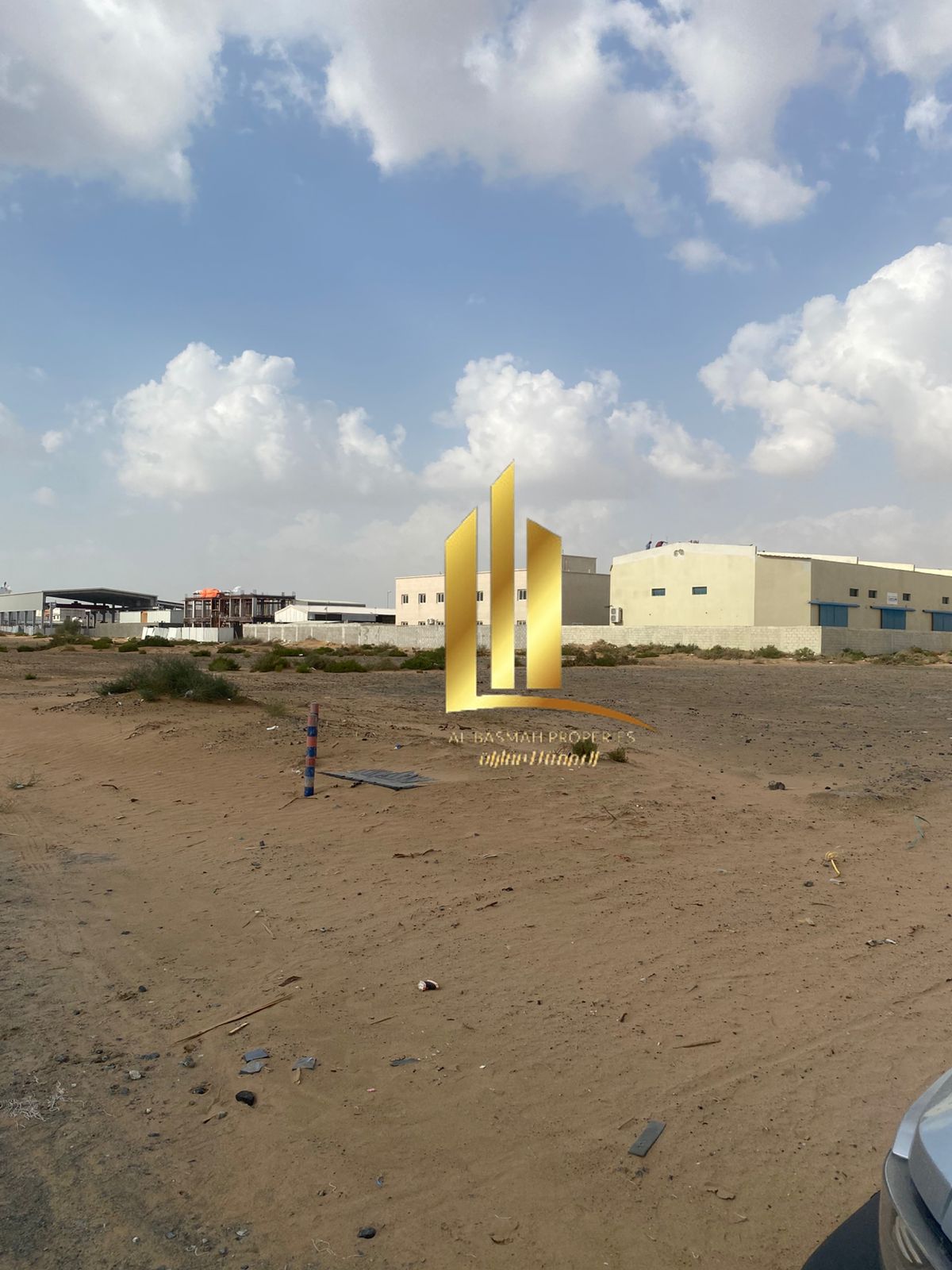 For sale in Al Sajaa Industrial, freehold land for all nationalities (39,802 square feet) on Al 36th Street.