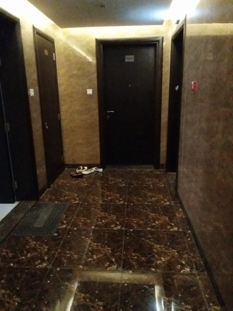 For annual rent in Sharjah, specifically in Al Nahda area: two bedrooms, a living room, a bathroom, built-in wardrobes, and central air conditioning.
