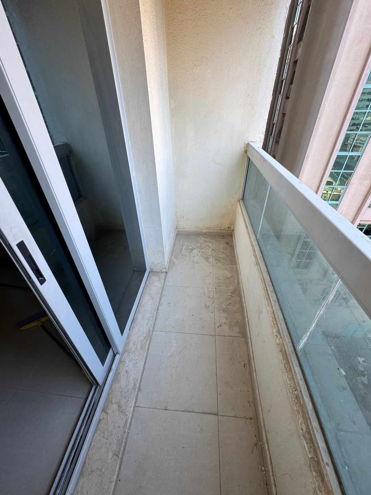 For annual rent in Sharjah, specifically in Al Khan area: a one-bedroom apartment with a living room, central air conditioning, and excellent size.