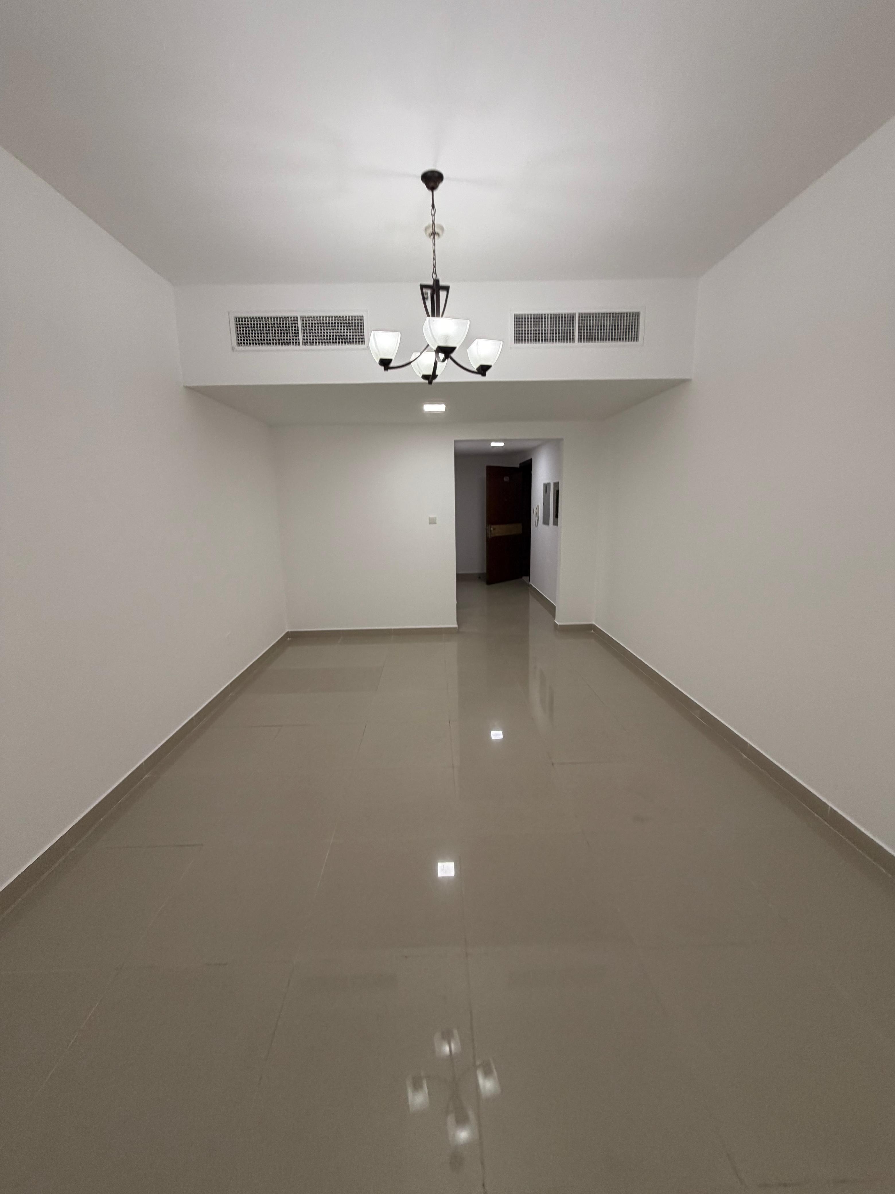 Apartment for sale in Al Majaz 2 1 bedroom and hall with kitchen, 2 bathrooms, master bedroom, central AC, area 776 sq. ft, ideal for living or inves