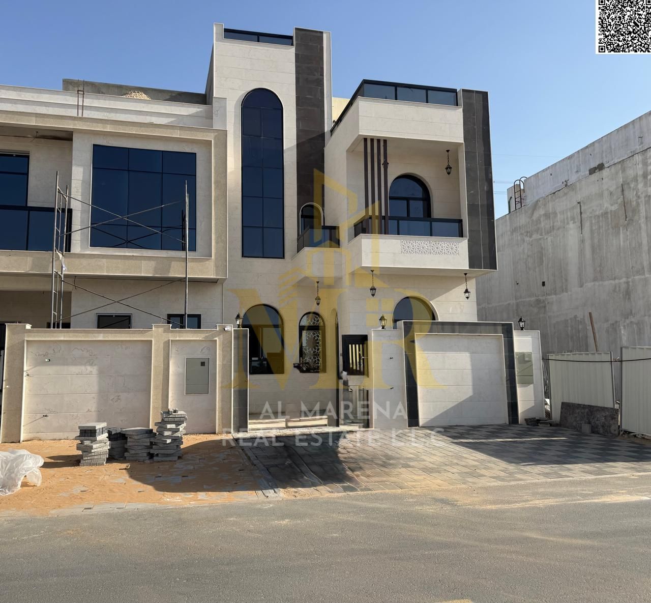For sale opposite Al Rahmaniya, Sharjah, near Emirates Road, including registration and ownership fees.
