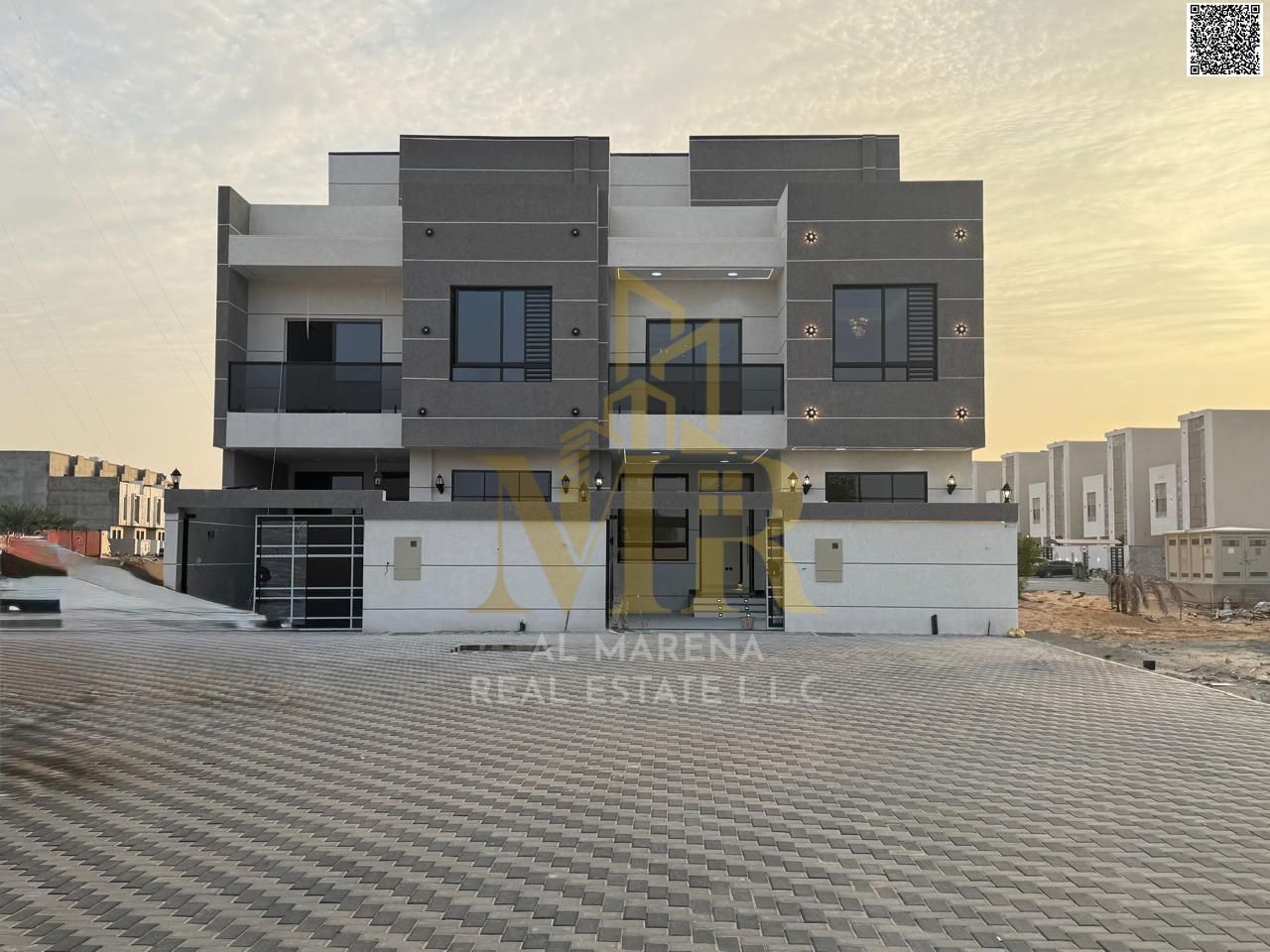 Luxury villa in Al Heliopolis, Ajman, ready for immediate occupancy, featuring high-end finishes and spacious living areas. Price includes registratio