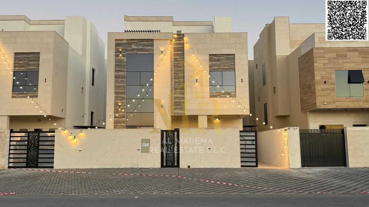 Modern villa for sale in Al Helio 2 area – Ajman. Excellent location. Includes registration and ownership fees. Two floors and a roof. Land area: 3014