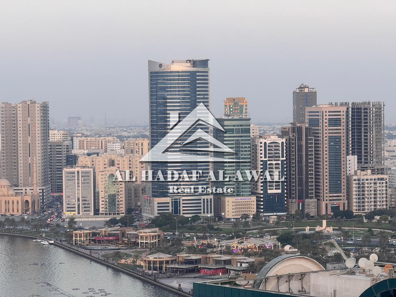 Two bedrooms and a living room in Al Qasba area, Najmat Al Qanat Tower, with a view. Rent is 6500 dirhams with internet only. Security deposit is 1000