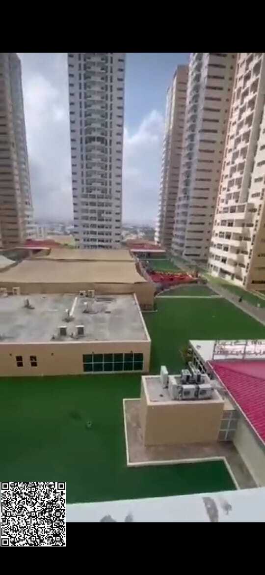 One bedroom and living room for sale in cash in Ajman Towers, with a closed kitchen.
