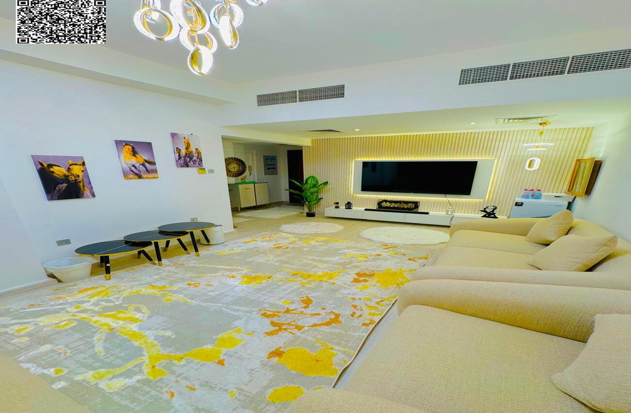 Two bedrooms and a living room for sale in Garden City Towers, furnished and with parking.