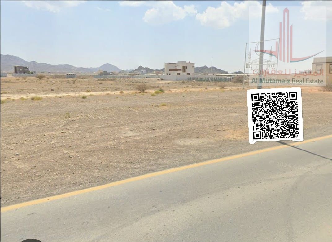 Residential/commercial land for sale in Masfout, on the corner of a street and alley.
