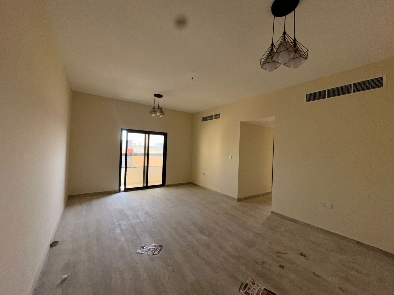 One bedroom and living room, two bathrooms, first occupancy, open view of the main street