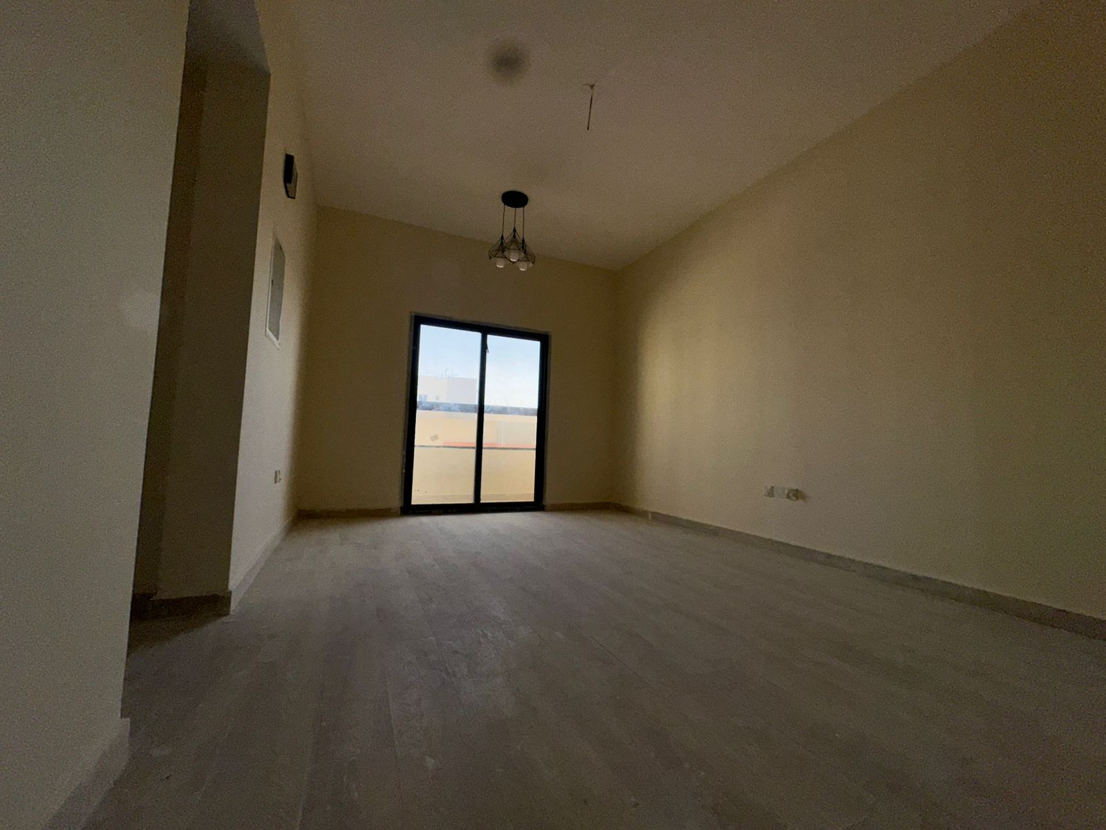 Two bedrooms, a living room, two bathrooms, a balcony, first occupancy, open view of the main street.