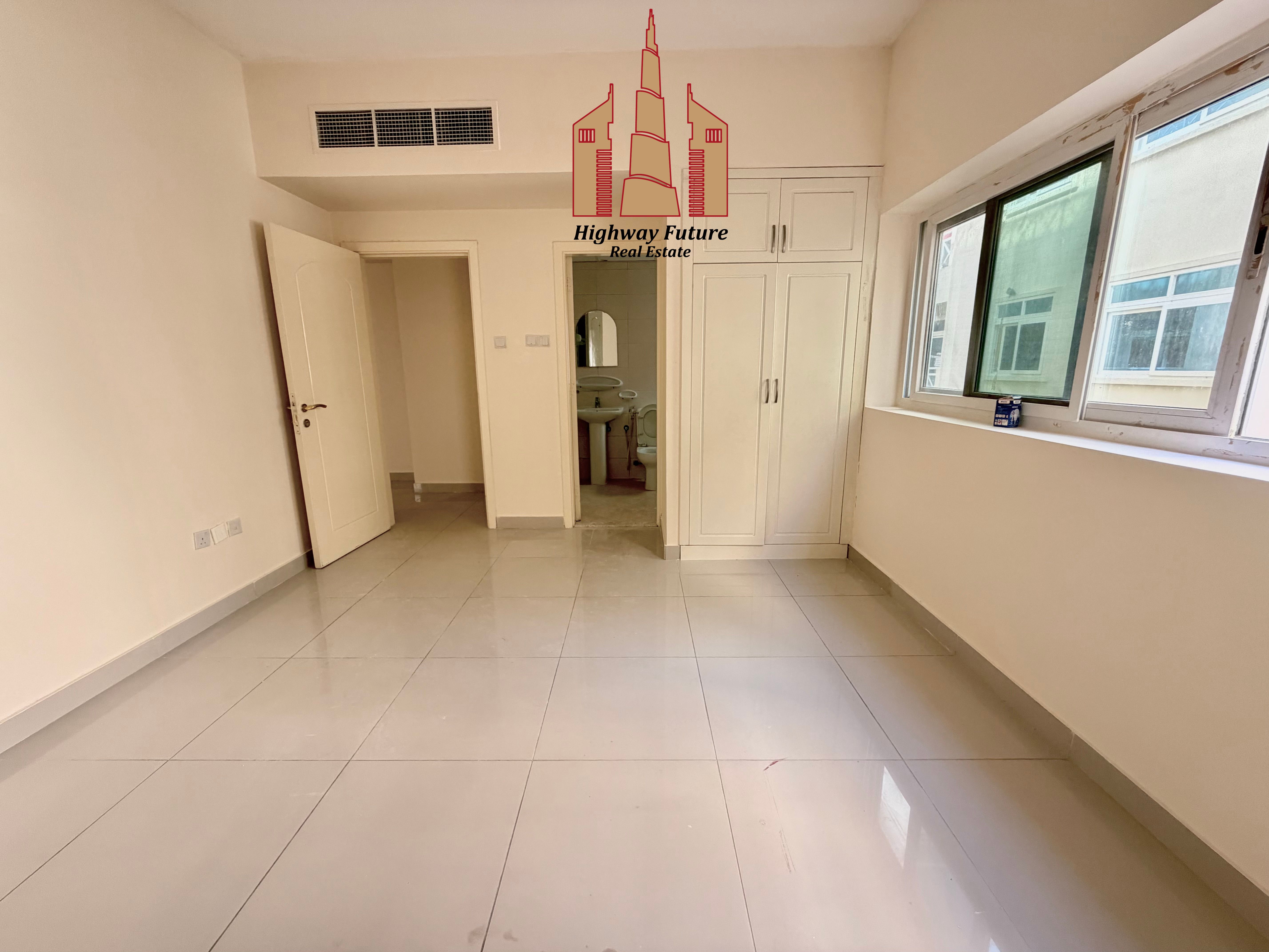Spacious 1Bedroom and Hall in 42,000 AED With balcony Covered Parking